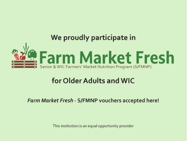 Advertisement sign that says We proudly participate in Farm Market Fresh for Older Adults and WIC