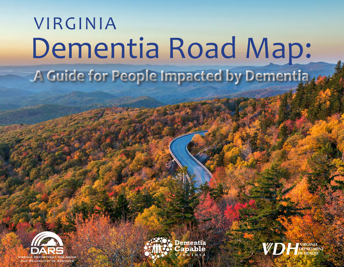 cover of dementia road map. photo of road winding through the mountains with colorful trees