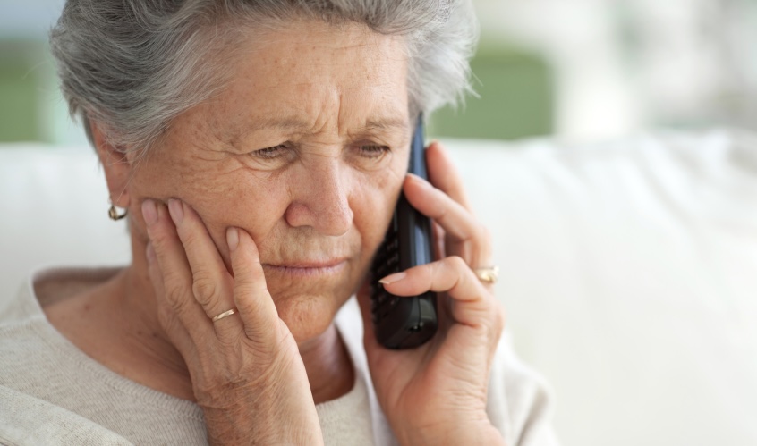 Concerned woman on telephone