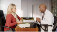 Doctor talking to patient